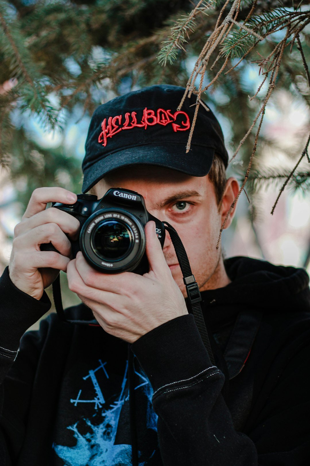 Portrait of a Chilean urban photographer standing in a city street